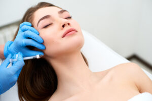 A woman getting cosmetic injections.